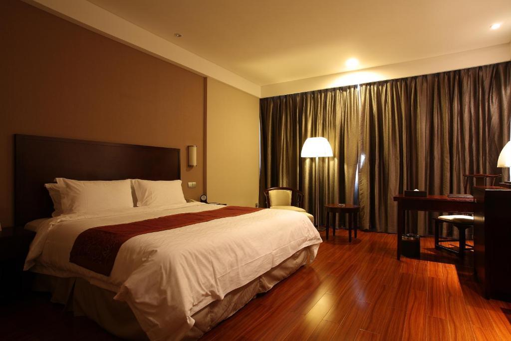 Hotel Ramada Suzhou Luzhi Zimmer foto